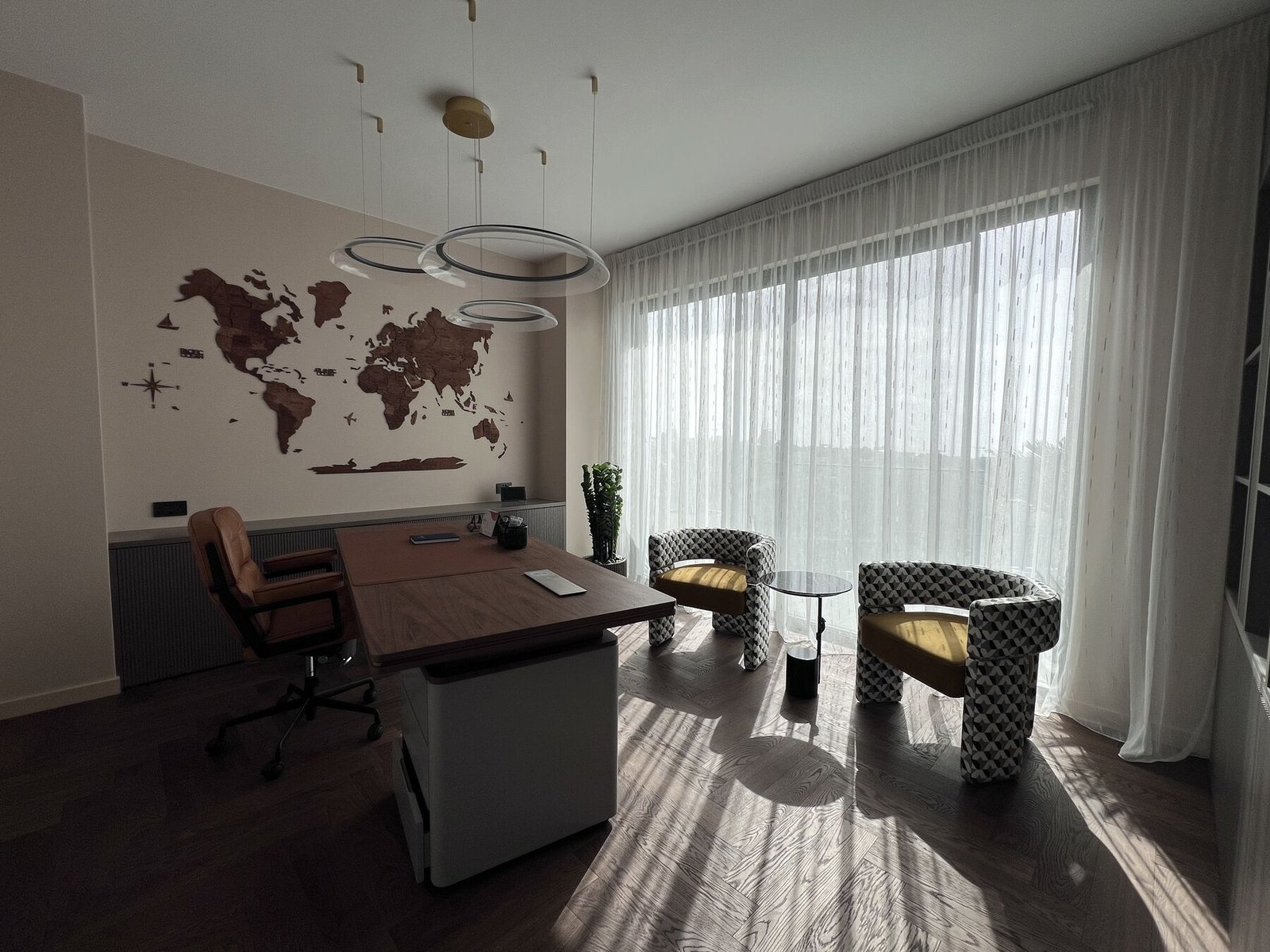 Study with walnut world map and herringbone floor